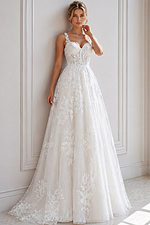 Whimsical Floral Wedding Gown with Flowing Tulle Skirt and Chapel Veil