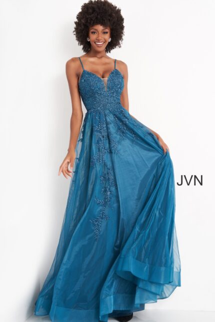 Model wearing Jovani 02266 blue gown with embroidery, front view.