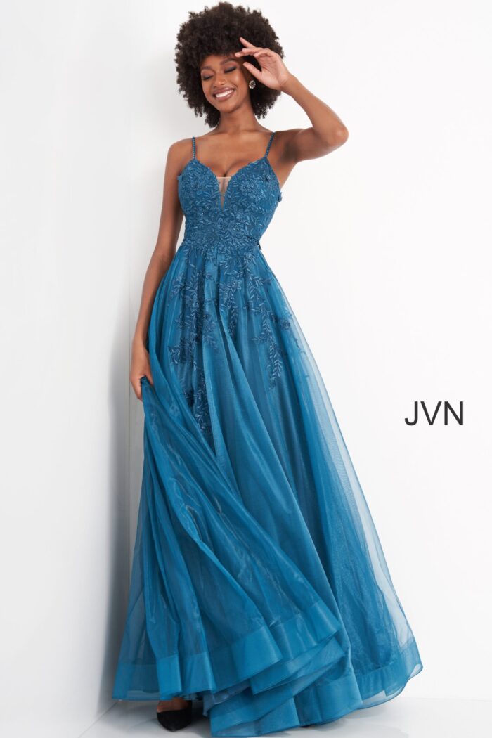 Model wearing Jovani 02266 blue gown, front view with flowing skirt.