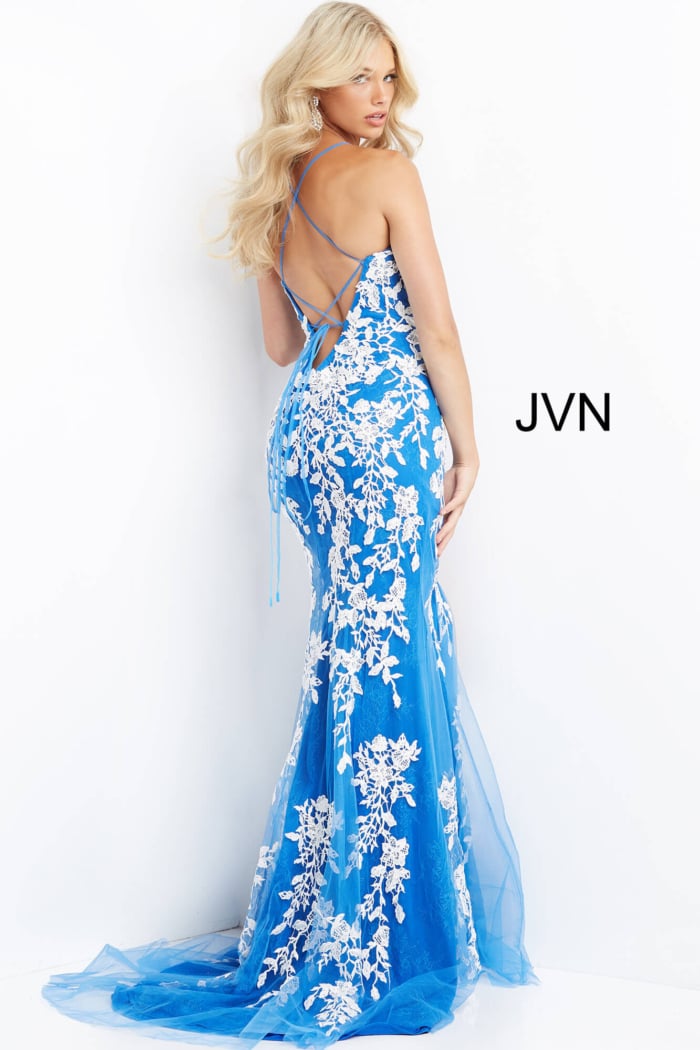 Model showing the back of Jovani 06660 blue dress with lace-up design.