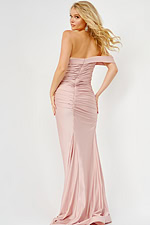Back view of model in Jovani 07640 blush gown, showing off-the-shoulder design and elegant train.