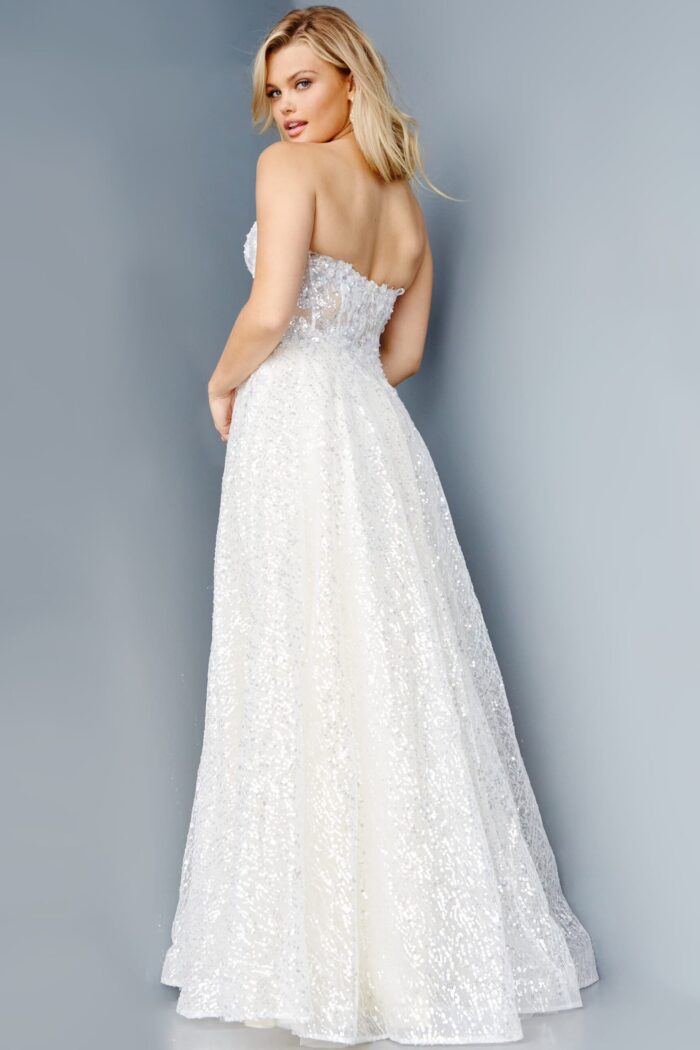 Model wearing Jovani 08417 ivory A-line dress back view