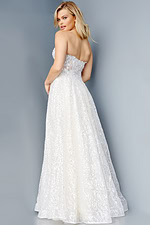 Back view of model wearing Jovani 08417 ivory dress with a sequin embellishment.