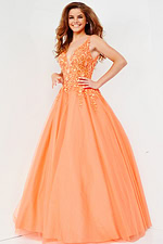 Model wearing Jovani 22831 orange gown with V-neckline and embroidered bodice
