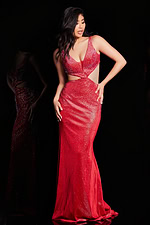Model in Jovani 23098 red gown, showcasing the mermaid silhouette and embellishments