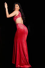 Back view of model in Jovani 23098 red mermaid gown showing the flow and fit