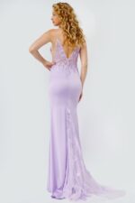 Back view of Jovani 23124 lilac gown with lace detailing and V-cut.