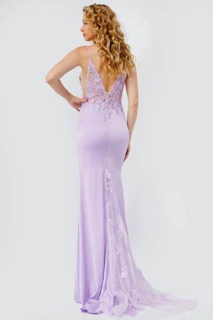 Back view of Jovani 23124 lilac gown with lace detailing and V-cut.