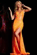 Model wearing Jovani 23216 orange dress with high slit and V-neckline, front view.