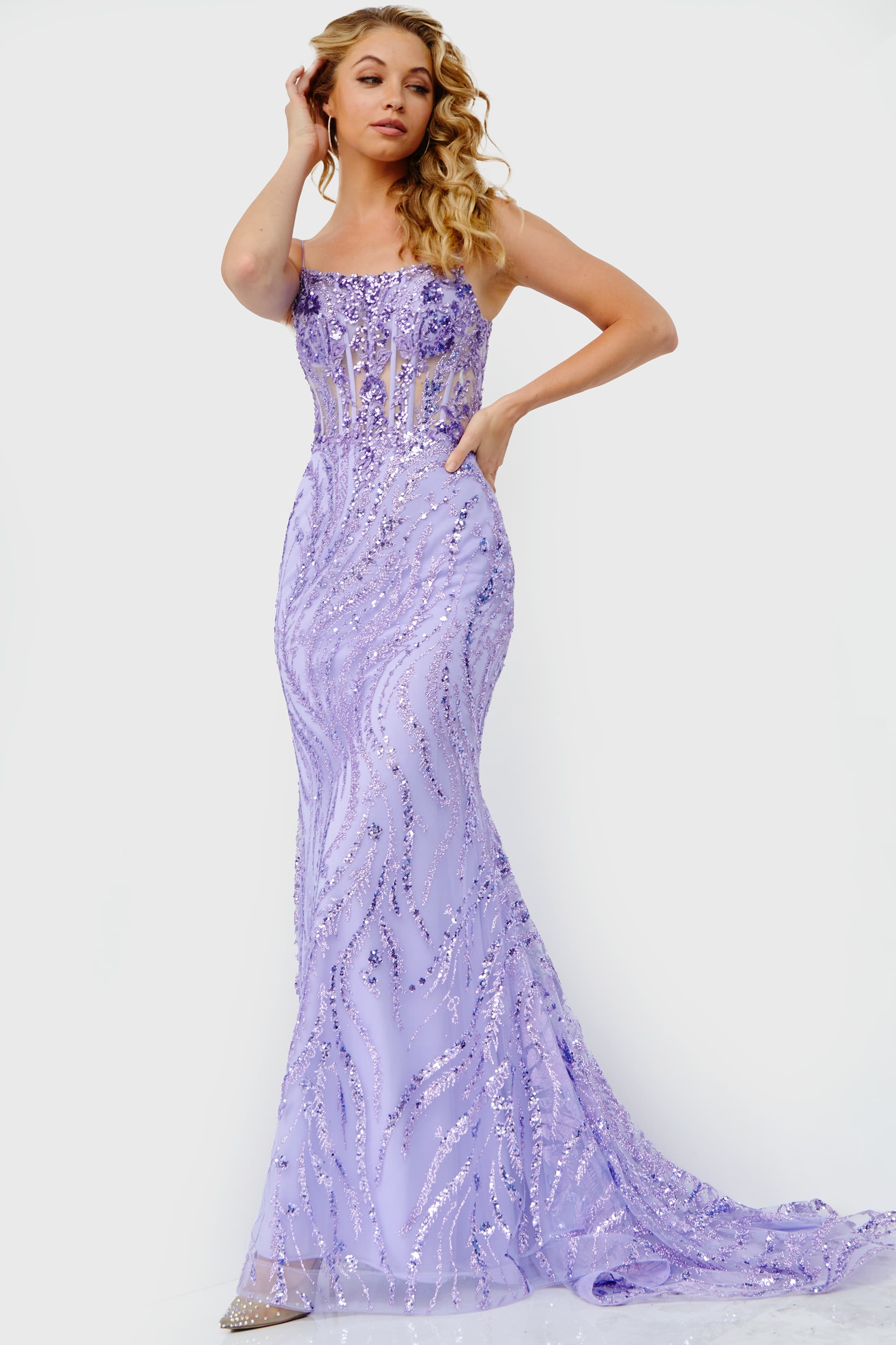 JVN23250-1-1.jpg Model wearing Jovani 23250 lilac mermaid gown with sequins and lace-up back.