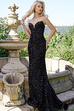Model wearing Jovani 23771 with a black sequin gown, front view.