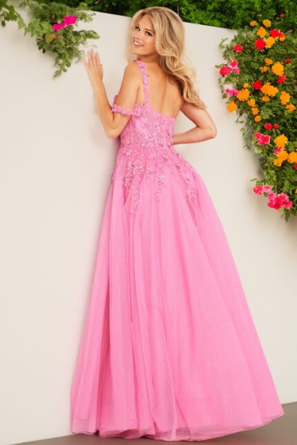 Back view of model wearing Jovani 25826 fuchsia gown with embroidery.