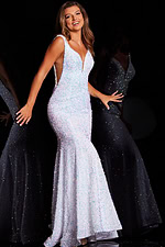 Model wearing Jovani 25914 ivory beaded mermaid gown front view.