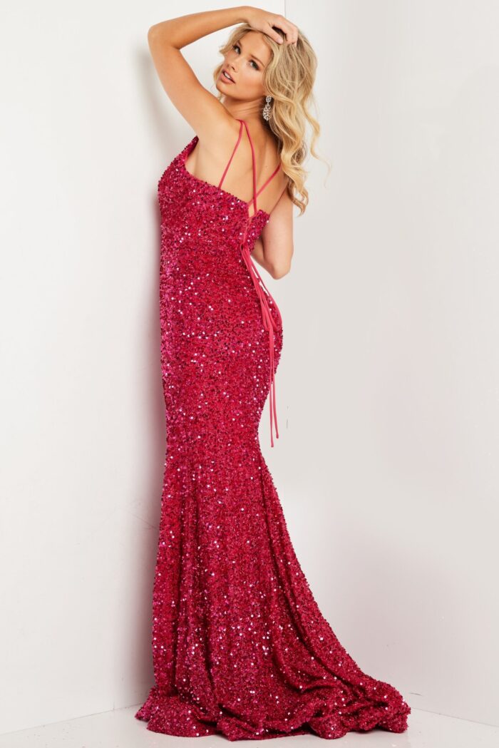 back view of model in Jovani 36437 red evening gown with cross straps