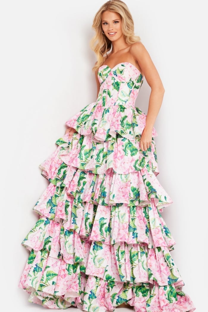 Model wearing Jovani 37058, showcasing front view with floral print and ruffle details