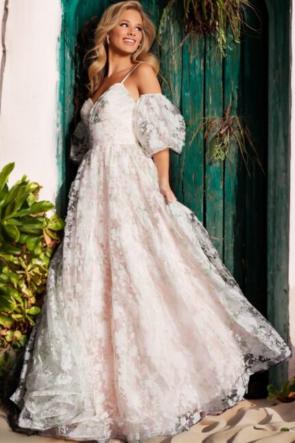 Elegant Jovani 37531 pink dress worn by model, featuring floral lace and puff sleeves.