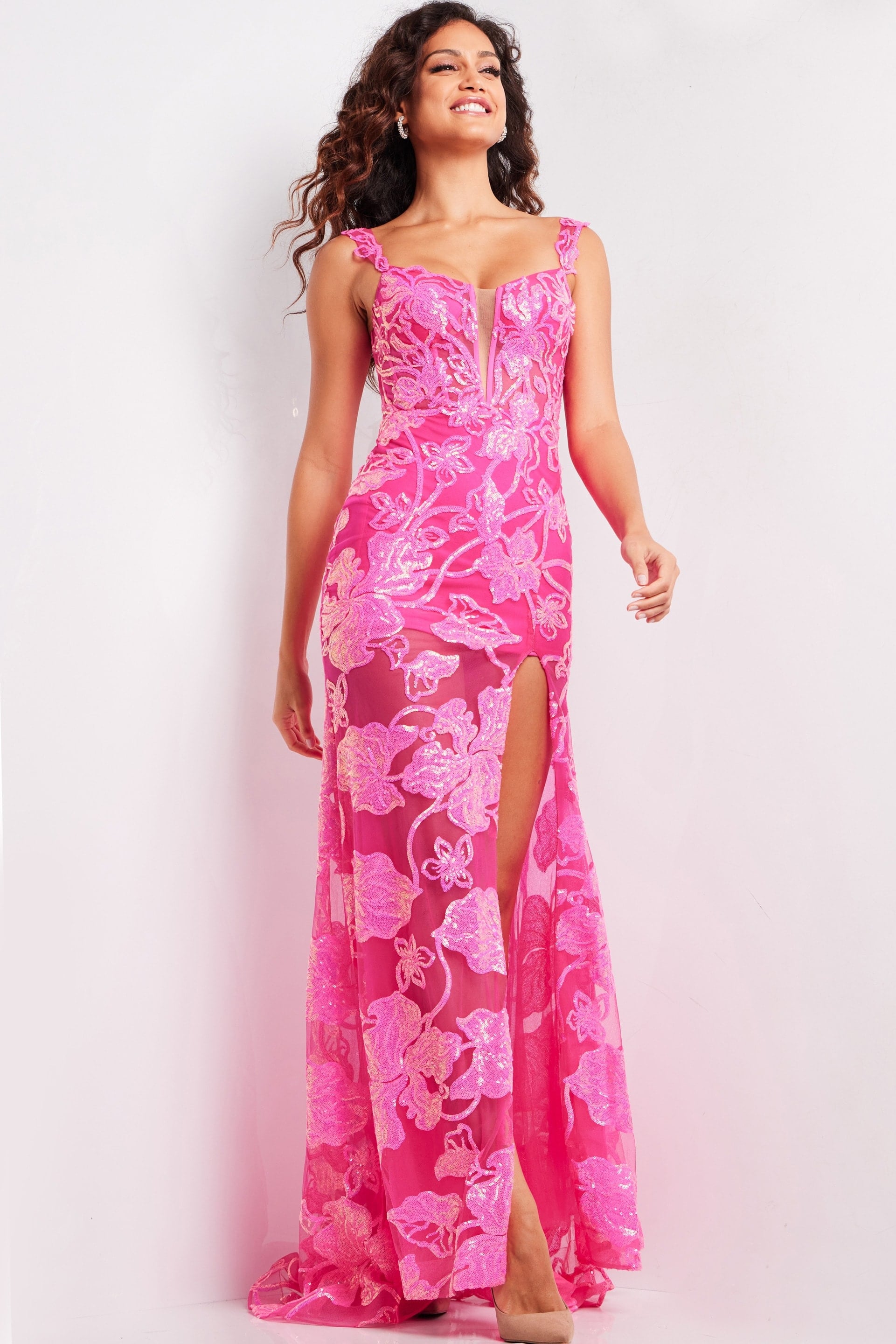 JVN38462_HOTPINK_2022.jpg Model wearing Jovani 38462 hot pink gown with floral embroidery and high slit, front view.