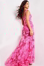 Model wearing Jovani 38462 hot pink gown with floral embroidery, back view.