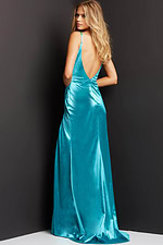 Back view of model wearing Jovani 03104 teal gown with deep V-cut.