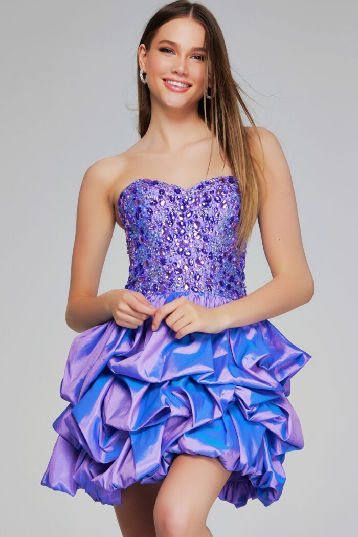 Model wearing Jovani K07390 lilac dress showcasing front details, with a beaded bodice and ruffled skirt.