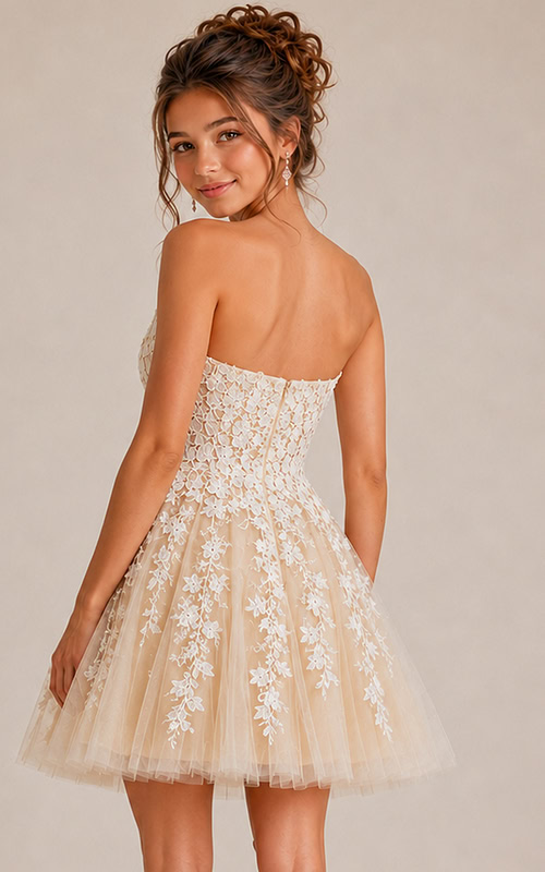 back view of ivory floral lace fit and flare dress with corset back and tulle skirt