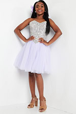 Model showcasing Jovani K22231 lilac dress, hands on hips with sequin detail.