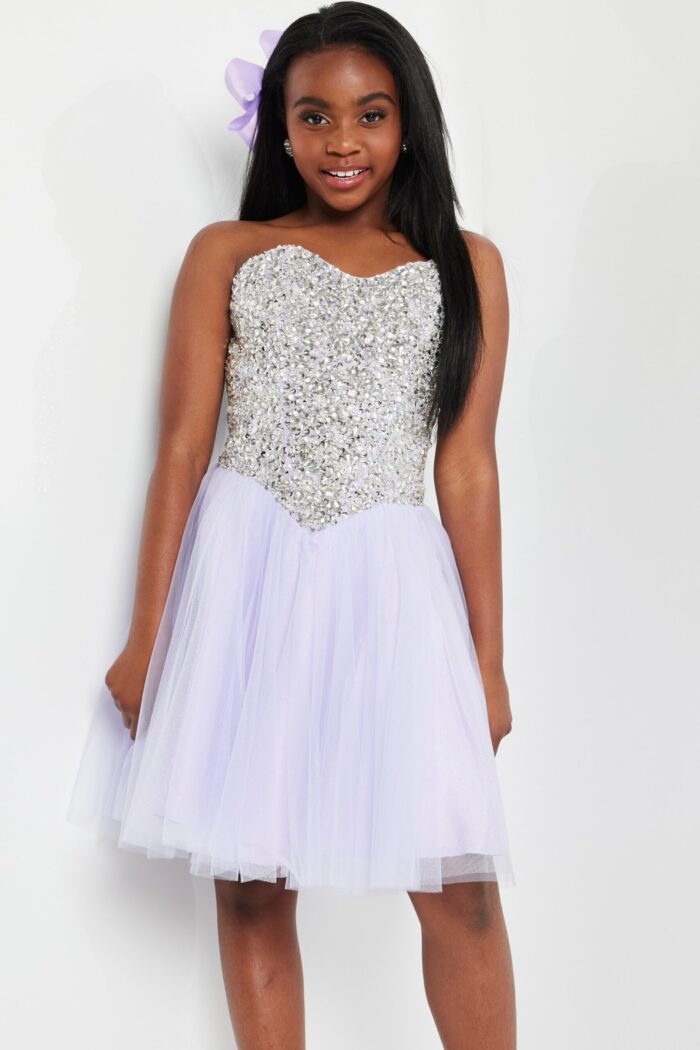 Model wearing Jovani K22231 lilac dress with sweetheart neckline and tulle skirt.