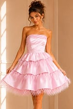 Model wearing Jovani K22326 pink dress with tiered ruffles a