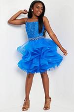 model in Jovani K23518 blue dress with vibrant skirt layers