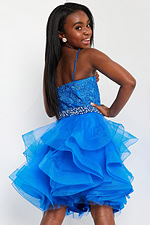 back view of Jovani K23518 blue dress highlighting ruffle details