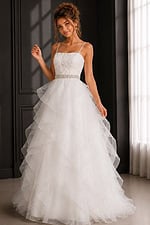 white spaghetti strap ball gown with tiered ruffle skirt, front view