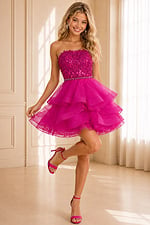 fuchsia ruffle dress with lace bodice and crystal belt, playful pose