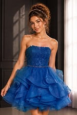 royal blue strapless dress with lace bodice and ruffled organza skirt