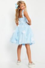 Back view of model in Jovani K25989 blue dress highlighting floral details