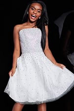 Front view of model holding dress sides wearing Jovani K2830 white embellished dress.