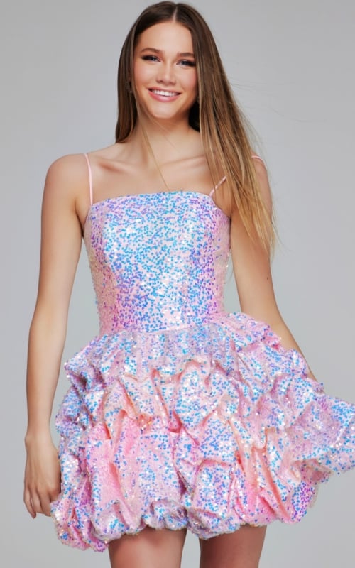 Model wearing K38108 pink mini dress showcasing strapless sequined bodice and ruffled skirt.