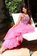Jovani K39018 hot pink V neck ball gown with crystal beaded floral bodice and ruffled organza layered skirt