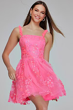 Front view of model in K39141 pink dress, A-line style with decorative straps.