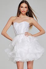 Front view of model in Jovani K39311 off-white mini dress, showcasing sweetheart neckline.