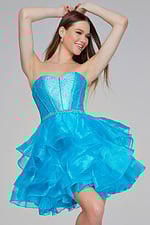 Model wearing Jovani K39311 turquoise dress, showcasing a chic mini length.