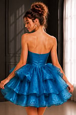 back view of blue ruffle dress with strapless bodice and zip back