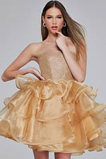 Model wearing Jovani K39312 dress in gold, front view