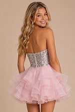 back view of pink dress with sequin bodice and ruffle organza skirt