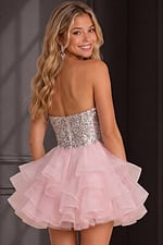 back view of pink ruffle organza dress with sparkling sequin bodice