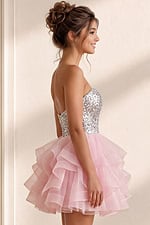 side view of pink sequin bodice dress with ruffled organza skirt