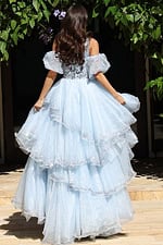 Off shoulder ruffle gown with layered skirt