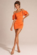 back view of orange off the shoulder dress with tiered ruffle sleeves