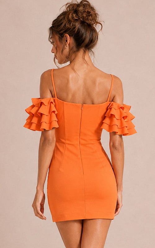 back view of orange fitted mini dress with tiered ruffle sleeve detail