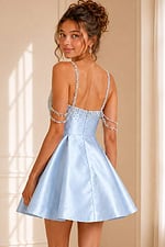 back view of light blue satin a line dress with beaded straps