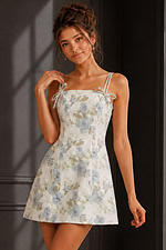 ivory and blue floral a line dress with tie straps and full skirt